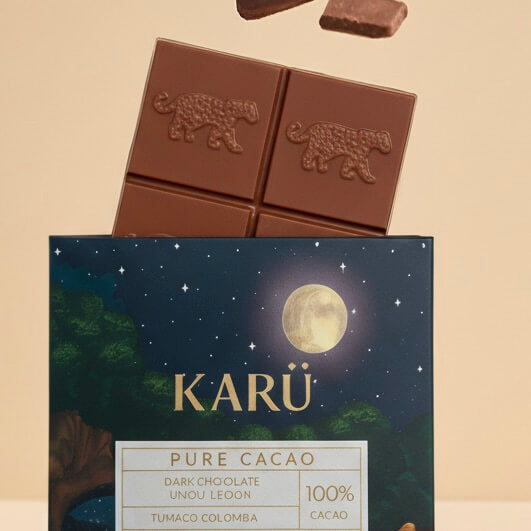 100% Cacao Chocolate Bar, Pure Cacao, Colombian Chocolate, packaged with a nighttime landscape of the Pearl of the Pacific